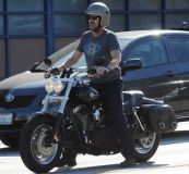 Hugh Laurie - Riding his Harley Davidson along the Sunset Boulevard - March 2012