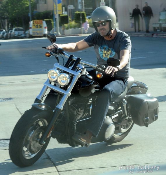 Hugh Laurie - Riding his Harley Davidson along the Sunset Boulevard - March 2012