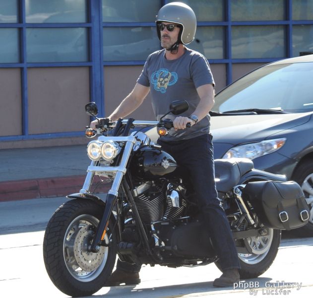 Hugh Laurie - Riding his Harley Davidson along the Sunset Boulevard - March 2012