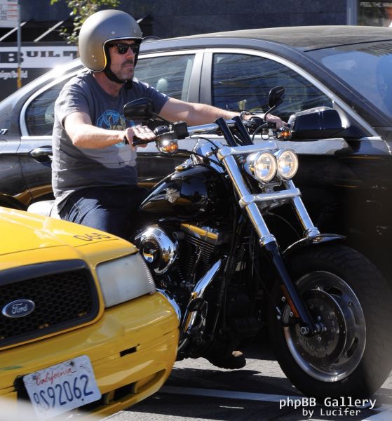 Hugh Laurie - Riding his Harley Davidson along the Sunset Boulevard - March 2012