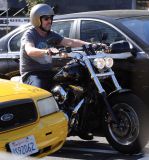 Hugh Laurie - Riding his Harley Davidson along the Sunset Boulevard - March 2012
