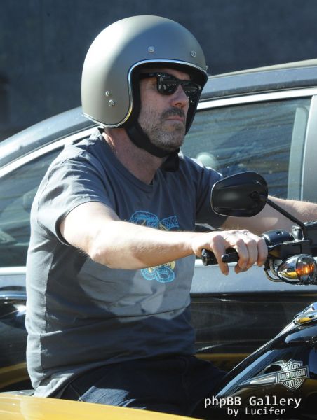 Hugh Laurie - Riding his Harley Davidson along the Sunset Boulevard - March 2012