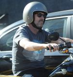 Hugh Laurie - Riding his Harley Davidson along the Sunset Boulevard - March 2012