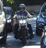 Hugh Laurie - Riding his Harley Davidson along the Sunset Boulevard - March 2012