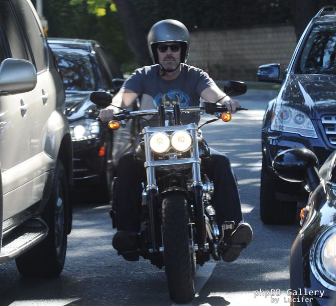 Hugh Laurie - Riding his Harley Davidson along the Sunset Boulevard - March 2012