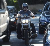 Hugh Laurie - Riding his Harley Davidson along the Sunset Boulevard - March 2012