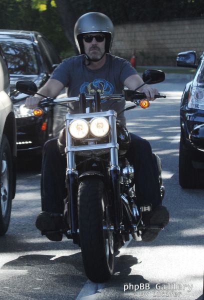 Hugh Laurie - Riding his Harley Davidson along the Sunset Boulevard - March 2012