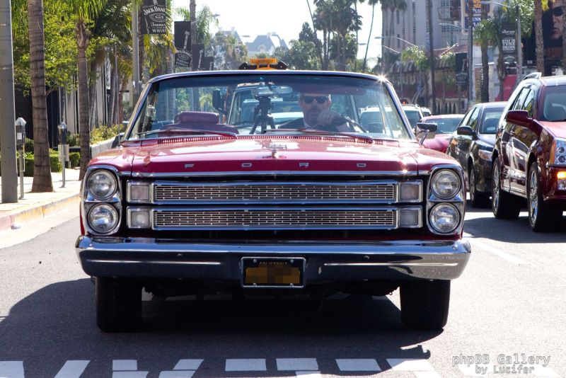 Hugh Laurie cruises the Sunset Strip in a 1966 Ford Galaxie 500 Convertible