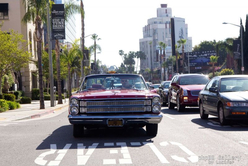 Hugh Laurie cruises the Sunset Strip in a 1966 Ford Galaxie 500 Convertible