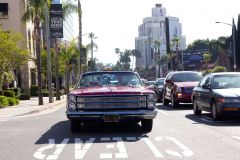 Hugh Laurie cruises the Sunset Strip in a 1966 Ford Galaxie 500 Convertible