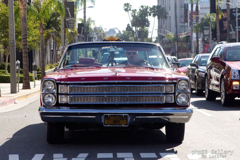 Hugh Laurie cruises the Sunset Strip in a 1966 Ford Galaxie 500 Convertible
